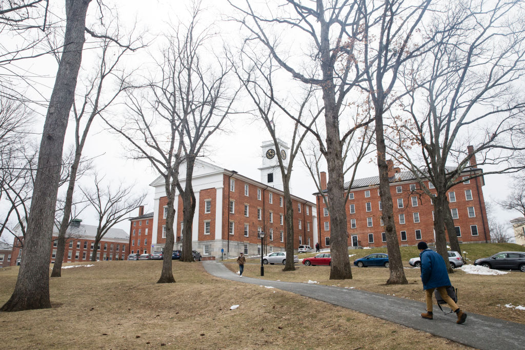 Students walk along the campus of Amherst College in Amherst, MA.