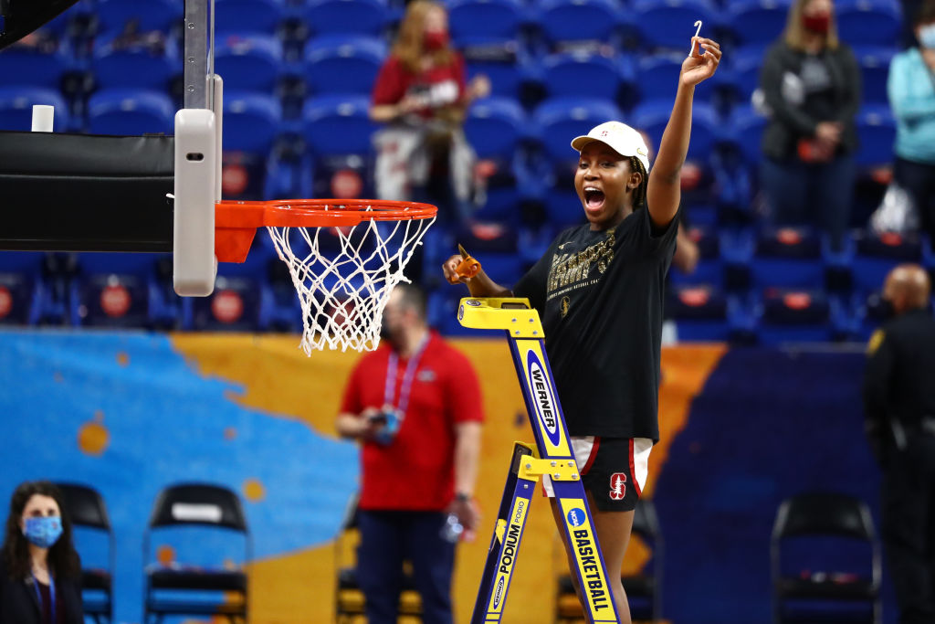 Agnes Emma-Nnopu of the Stanford Cardinal cuts down the net after the NCAA Women’s Basketball championship game on April 4, 2021.