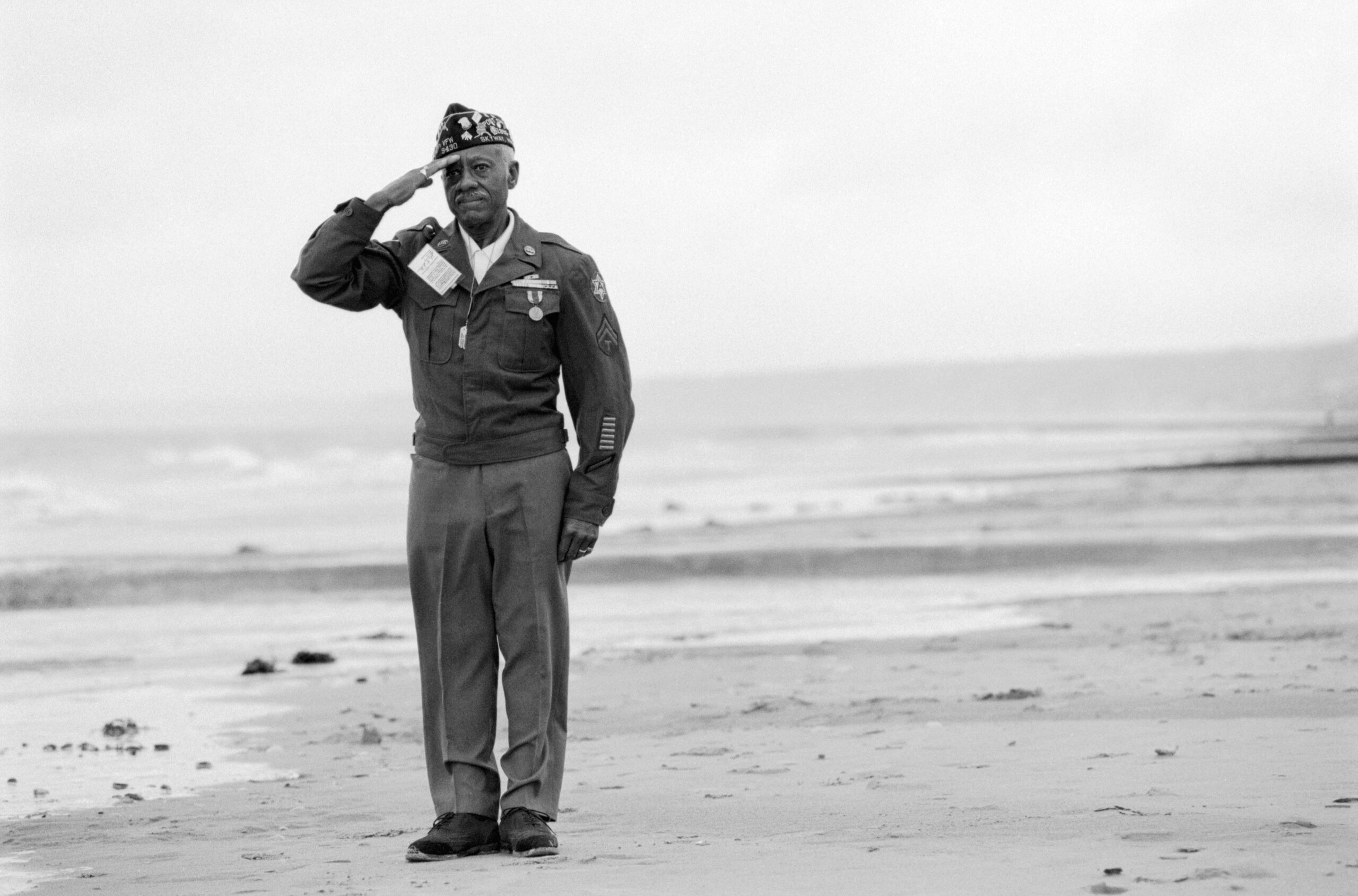 World War II Veteran Saluting on Beach