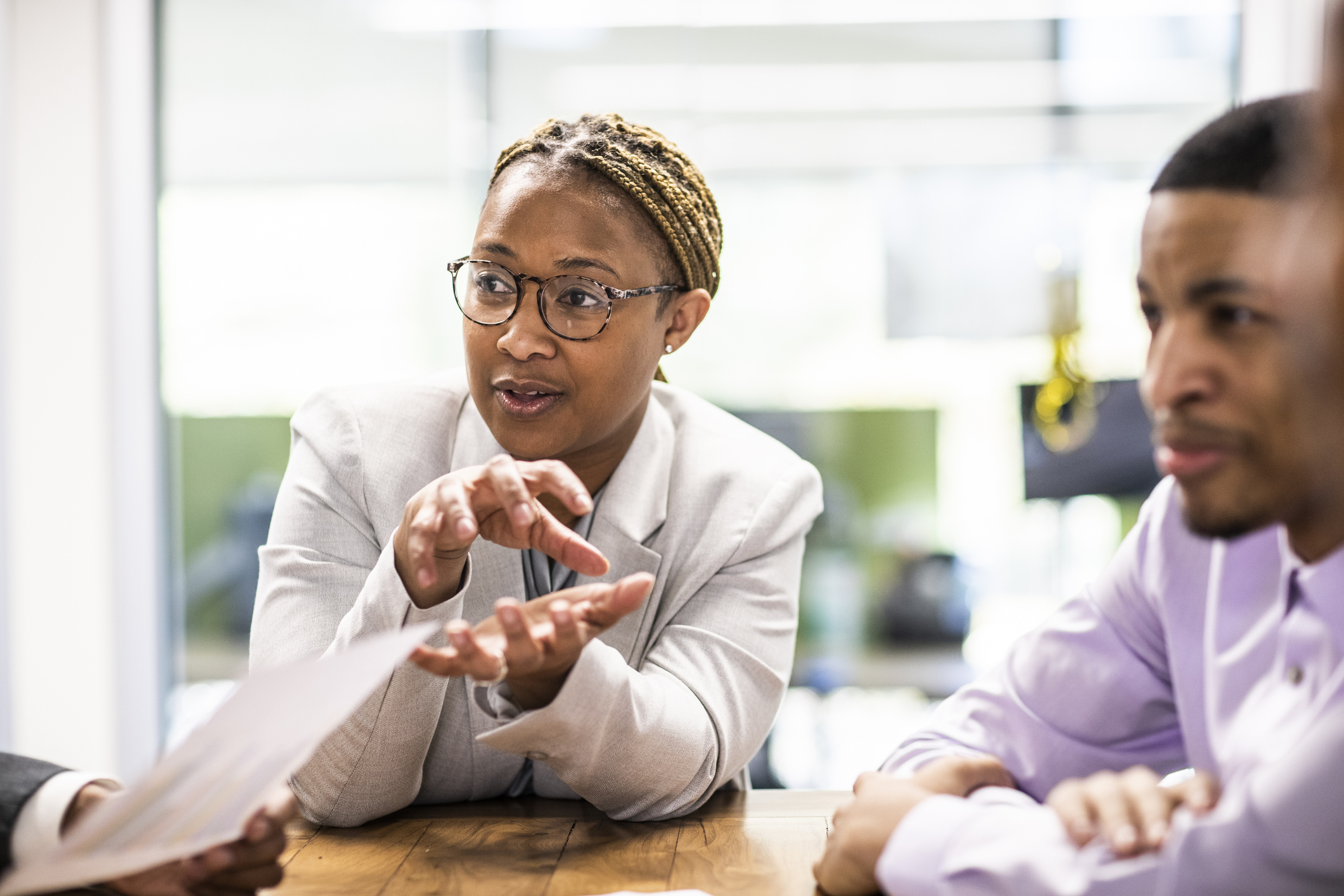 Businesswoman leading office discussion