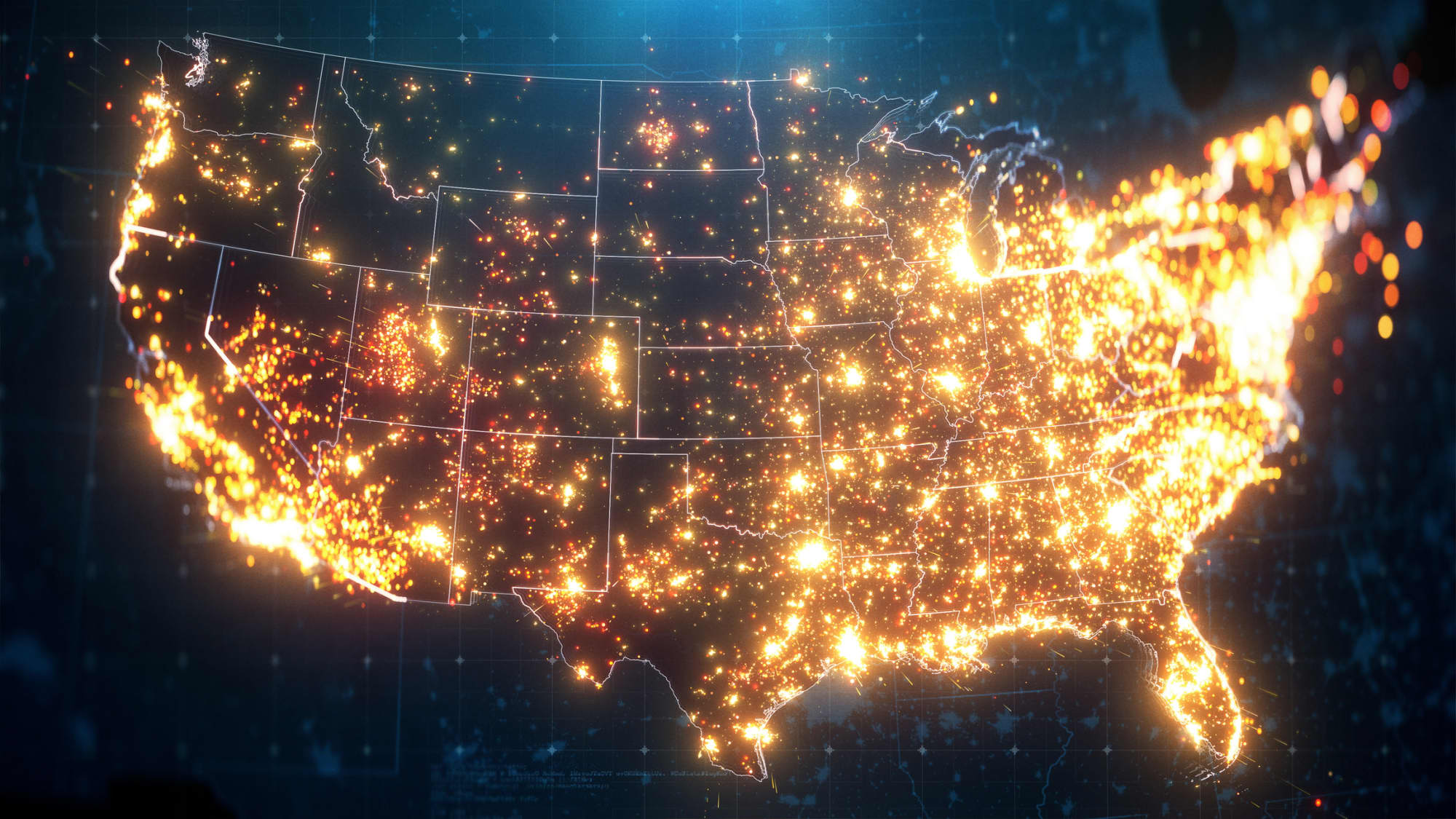 Satellite map of the U.S. at night showing city lights in populated areas.