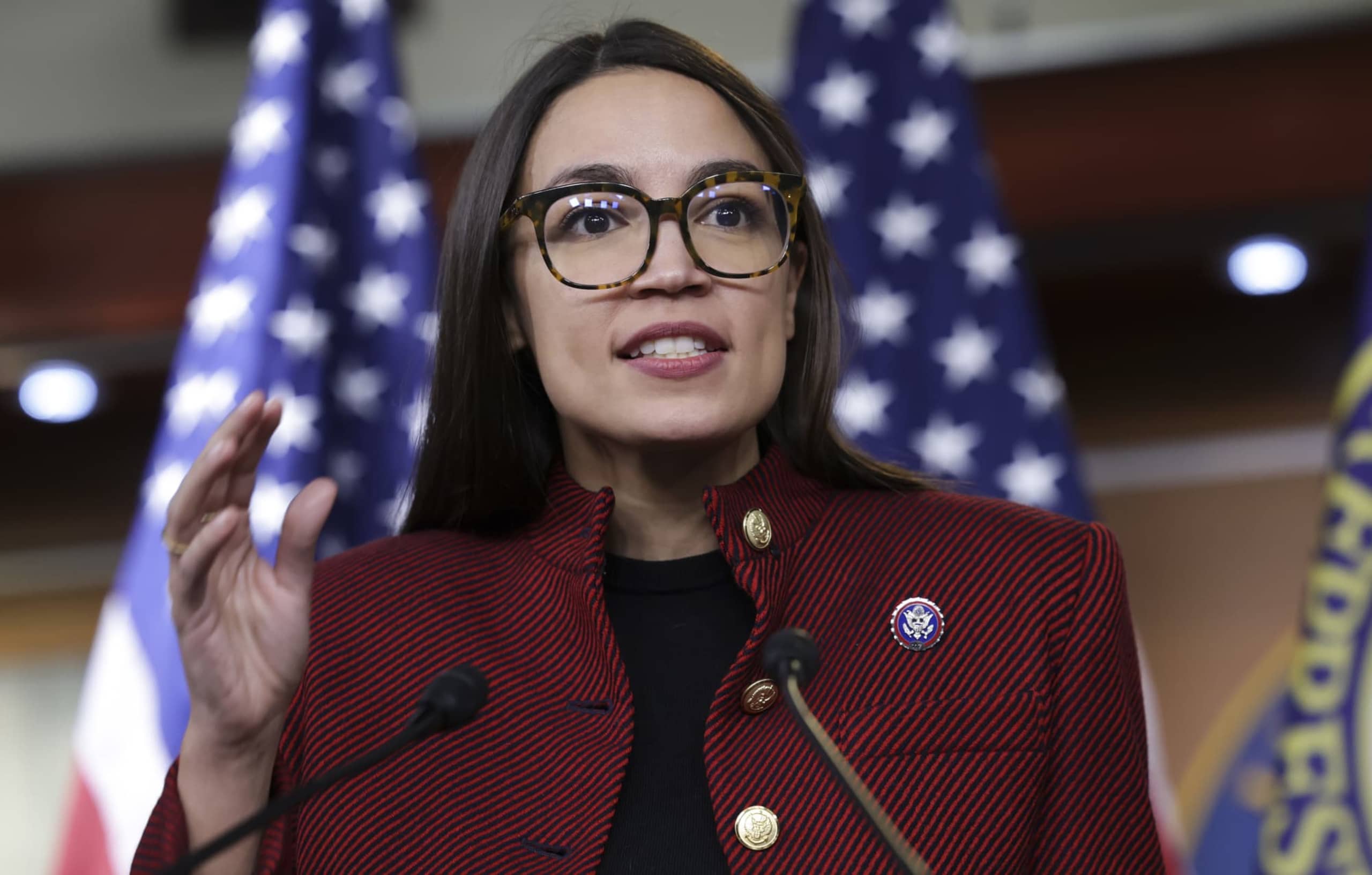 U.S. Rep. Alexandria Ocasio-Cortez (D-NY) speaks on banning stock trades for members of Congress at news conference on Capitol Hill