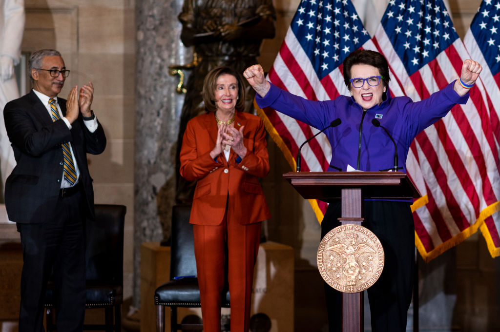 US Representative Bobby Scott and Speaker of the House Nancy Pelosi clap as tennis star Billie Jean King speaks during a Women's History Month event celebrating the 50th anniversary of Title IX.