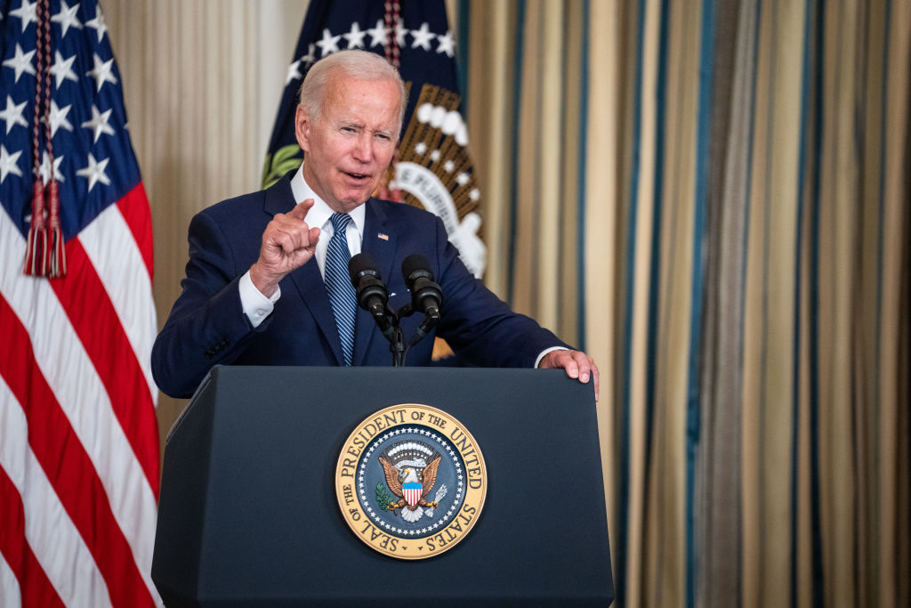 WASHINGTON, DC - AUGUST 16: President Joe Biden delivers remarks and signs H.R. 5376, the Inflation Reduction Act of 2022 into law in the State Dining Room of the White House on Tuesday, Aug. 16, 2022 in Washington, DC. The 737 billion dollar bill focuses on climate change, lowering health care costs and creating clean energy jobs.