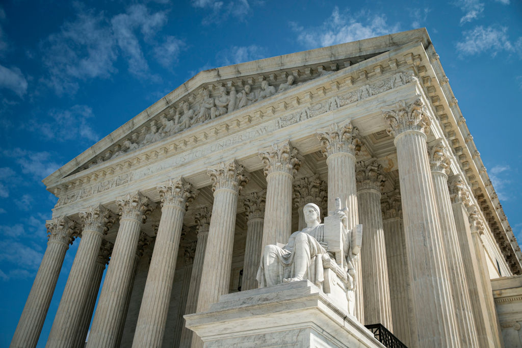 The Guardian or Authority of Law sculpture on the side of the U.S. Supreme Court building in Washington, DC.