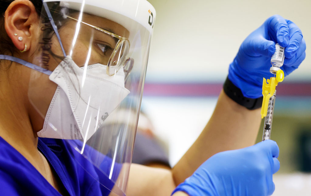 LOS ANGELES, CALIFORNIA - AUGUST 10: Licensed Vocational Nurse (LVN) Gabriela Solis prepares a dose of the Jynneos monkeypox vaccine at an L.A. County vaccination site in East Los Angeles on August 10, 2022 in Los Angeles, California. Los Angeles County reported 683 monkeypox cases as of August 9th, double the amount of cases from ten days earlier. California Governor Gavin Newsom declared a state of emergency on August 1st over the monkeypox outbreak which continues to grow globally.