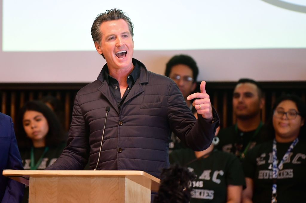 California Governor Gavin Newsom gestures as he speaks on a visit to East Los Angeles College on August 29, 2019 in Monterey Park, California. - Newsom spoke about the California College Promise Program, which will provide two free years of community college to any first-time, full-time California student.