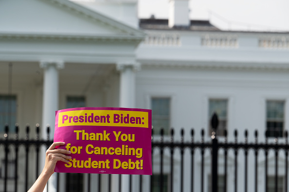 WASHINGTON, DC - AUGUST 25: George Washington University student Kai Nilsen and other student loan debt activists rally outside the White House a day after President Biden announced a plan that would cancel $10,000 in student loan debt for those making less than $125,000 a year in Washington, DC, on August 25, 2022.