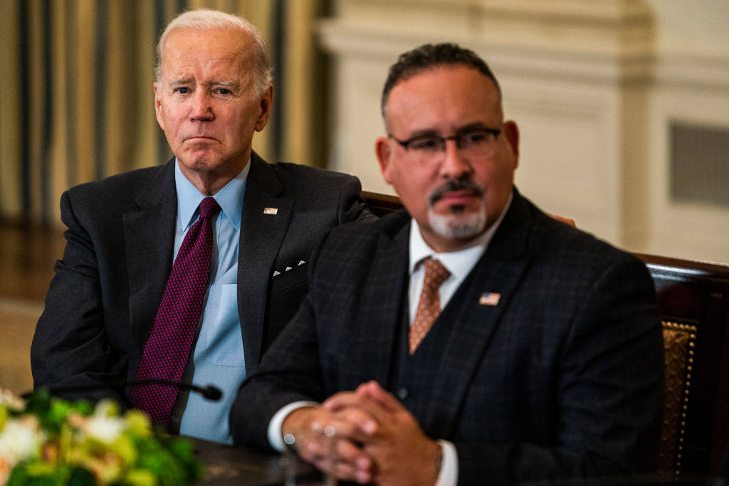 U.S. President Joe Biden and Department of Education Secretary Miguel Cardona during the second meeting of the Task Force on Reproductive Healthcare Access in the State Dining Room on Tuesday, October 4, 2022.