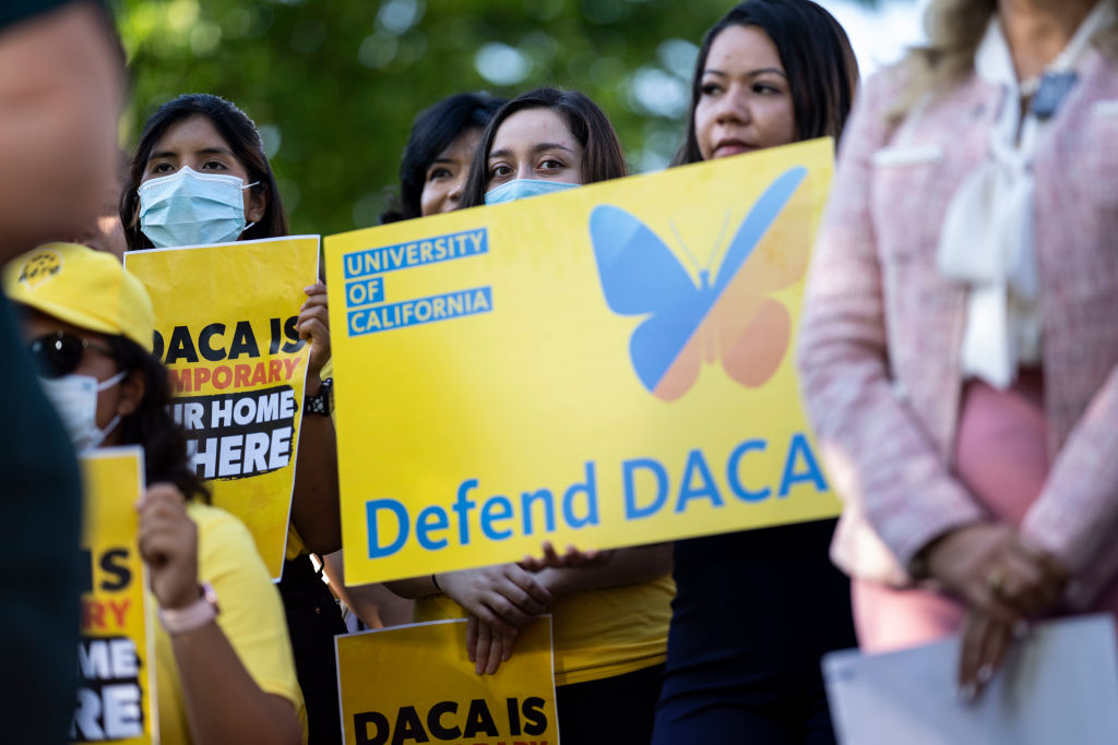 WASHINGTON, DC - JUNE 15: Activists listen during a news conference marking the 10th anniversary of the passing of Deferred Action for Childhood Arrivals (DACA), on Capitol Hill on Wednesday, June 15, 2022 in Washington, DC. The news conference comes just weeks before the Fifth Circuit Court of Appeals is slated to hear oral arguments in a case that will determine DACAs future viability, and is part of a larger fly-in of Dreamers, educators, and business leaders who will be meeting with their Members of Congress. (Kent Nishimura / Los Angeles Times via Getty Images)