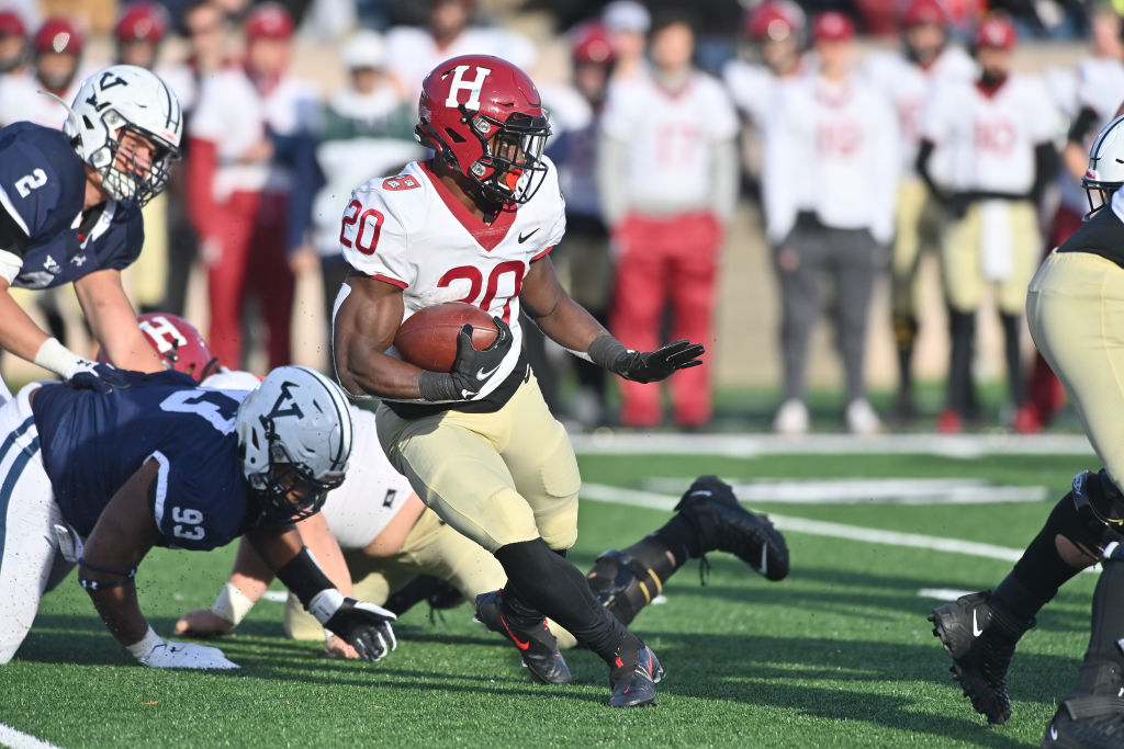 NEW HAVEN, CT - NOVEMBER 20: Harvard Crimson running back Aaron Shampklin (20) rushes down the field during the game as the Harvard Crimson take on the Yale Bulldogs on November 20, 2021, at the Yale Bowl in New Haven, Connecticut. (Photo by Williams Paul/Icon Sportswire via Getty Images)