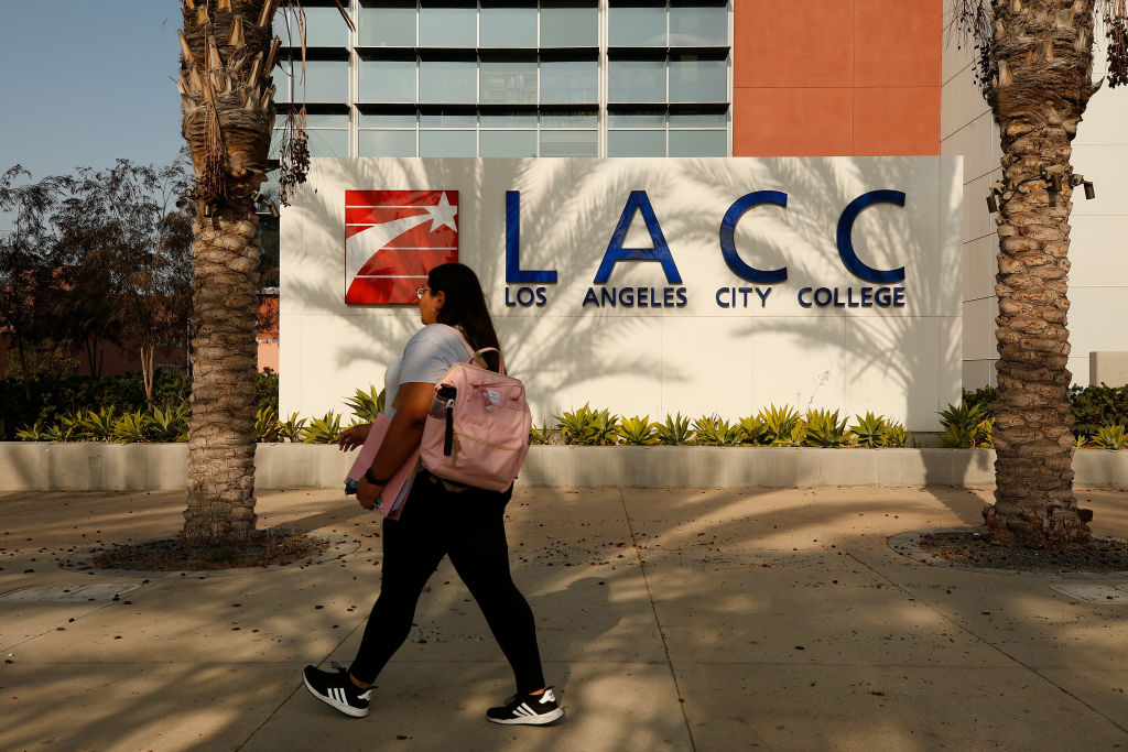 LOS ANGELES, CA - AUGUST 30: A portion of the enrolled student body returns to in-class instruction for the reopening on Monday August 30th of Los Angeles City College (LACC) in the LACCD, the nation's largest community college district. School will look a bit different this year, as masks will be required on-campus. A majority of students at LACC are continuing with online classes for this Fall semester LA City College on Monday, Aug. 30, 2021 in Los Angeles, CA. (Al Seib / Los Angeles Times via Getty Images).