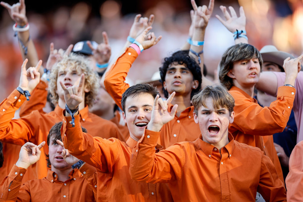 AUSTIN, TEXAS - OCTOBER 01: Texas Longhorns fans cheer during the game against the West Virginia Mountaineers at Darrell K Royal-Texas Memorial Stadium on October 01, 2022 in Austin, Texas. (Photo by Tim Warner/Getty Images)