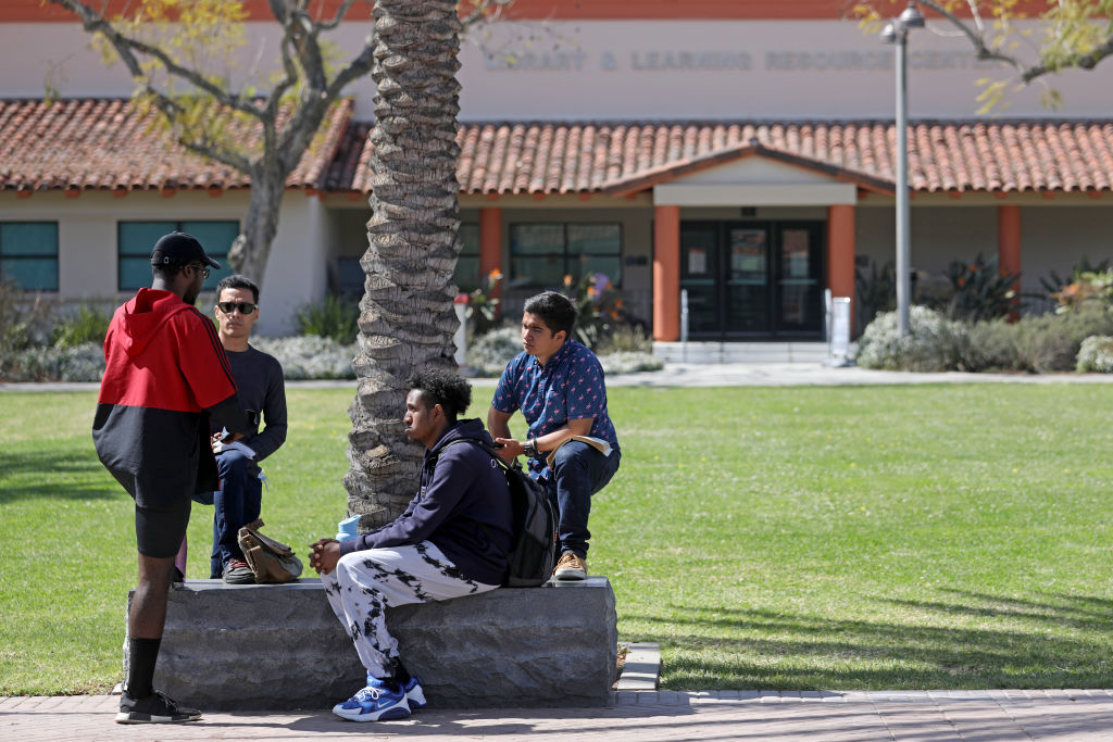 LONG BEACH, CA - MARCH 16: Students gather at Long Beach City College on Wednesday, March 16, 2022 in Long Beach, CA. Enrollment at California Community Colleges has plummeted nearly 20% during the pandemic to about 1.3 million students from fall 2019 to fall of 2021, according to state data. (Gary Coronado / Los Angeles Times via Getty Images)