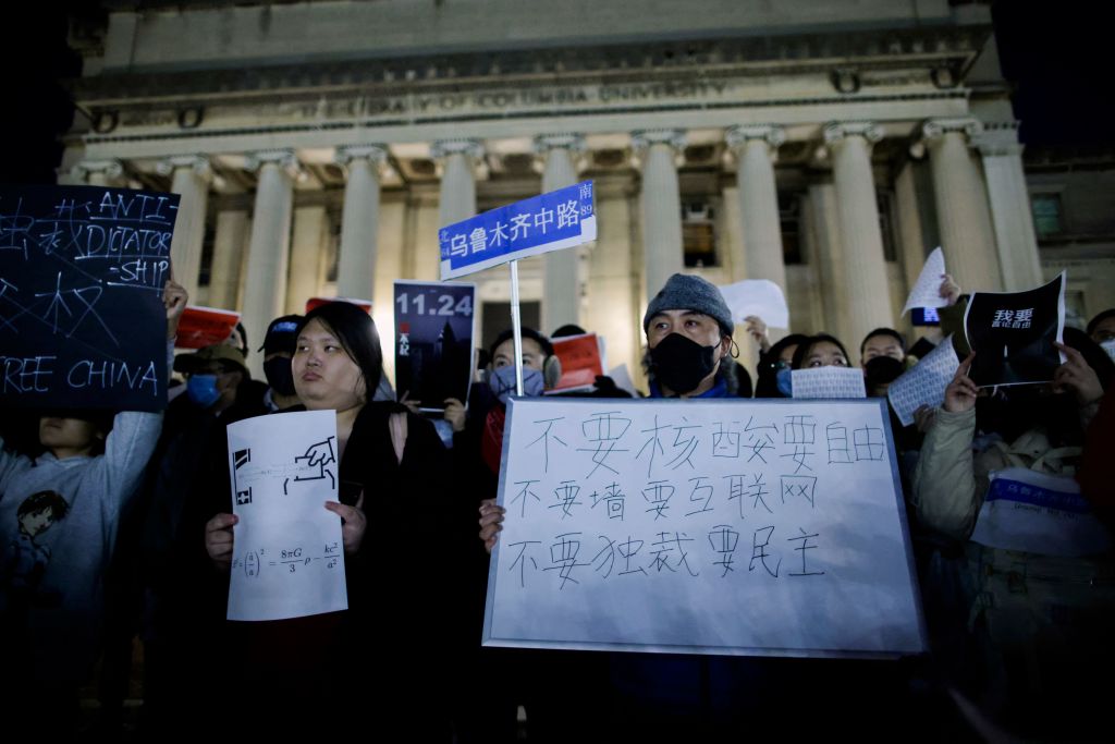 People gather at Columbia University during a protest in support of demonstrations held in China calling for an end to Covid-19 lockdowns, in New York on November 28, 2022. - People have taken to the streets in major cities and gathered at university campuses across China in a wave of nationwide protests not seen since pro-democracy rallies in 1989 were crushed. (Photo by KENA BETANCUR / AFP) (Photo by KENA BETANCUR/AFP via Getty Images)