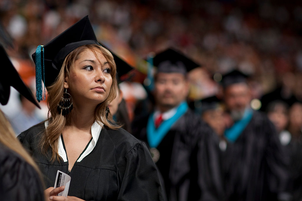 Community college graduation ceremonies for associates degrees at El Paso Community College in El Paso, Texas. (Photo by Robert Daemmrich Photography Inc/Corbis via Getty Images)