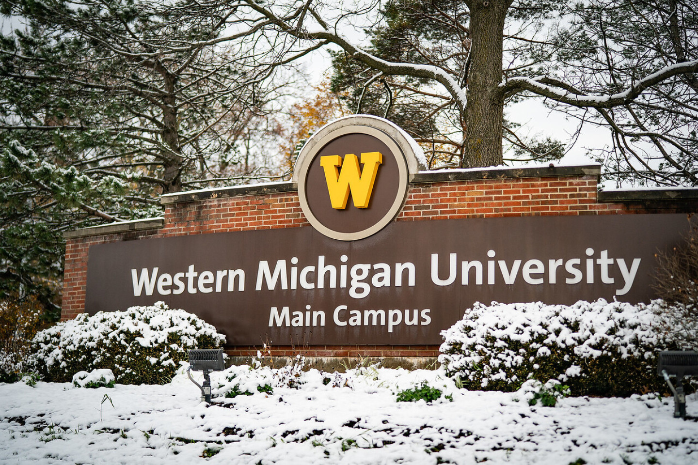 A picture of the front sign at Western Michigan University outside in the snow. The sign reads: Western Michigan University Main Campus.