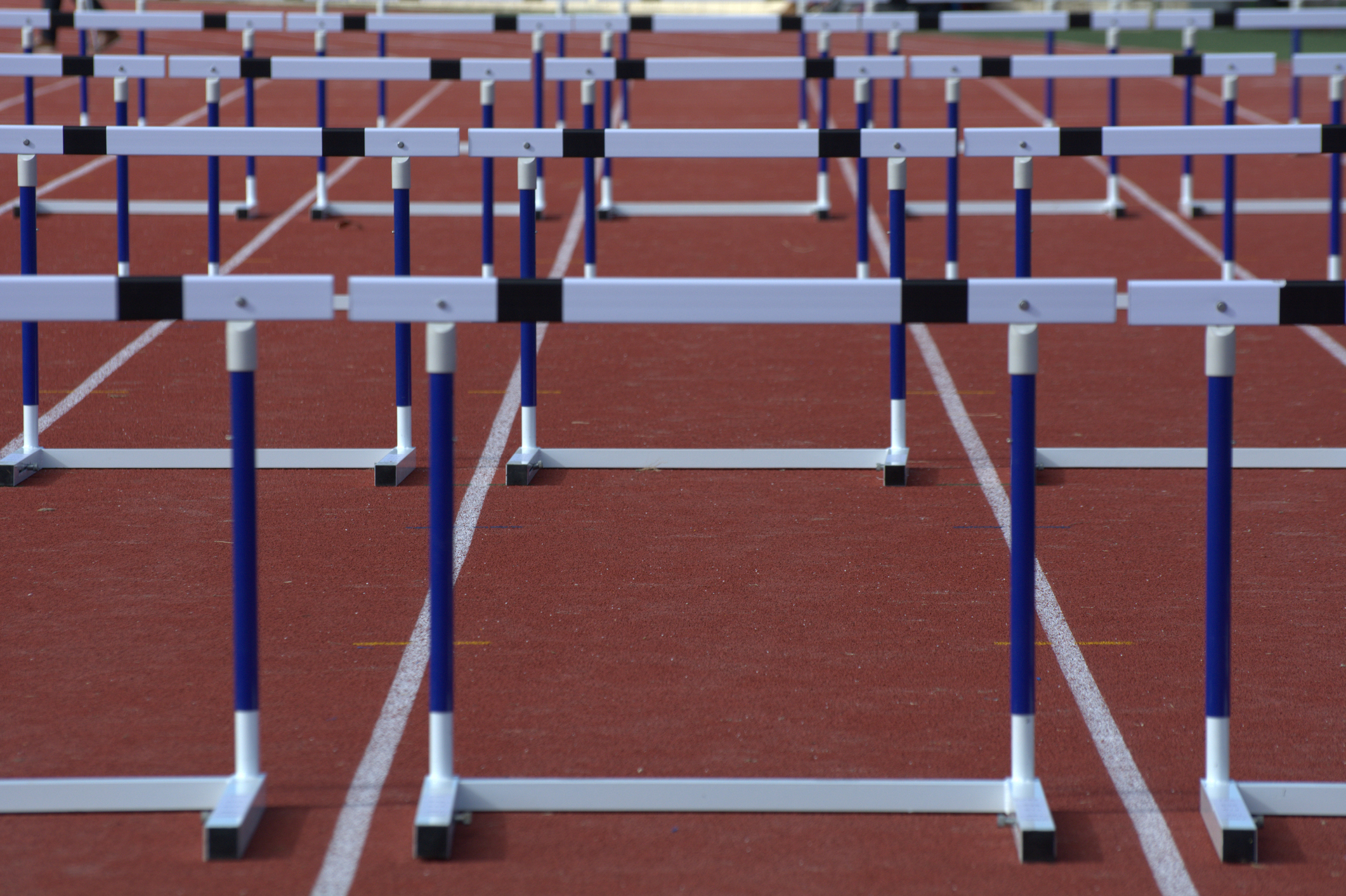 Athletic track ready for a hurdles race in a outdoor stadium