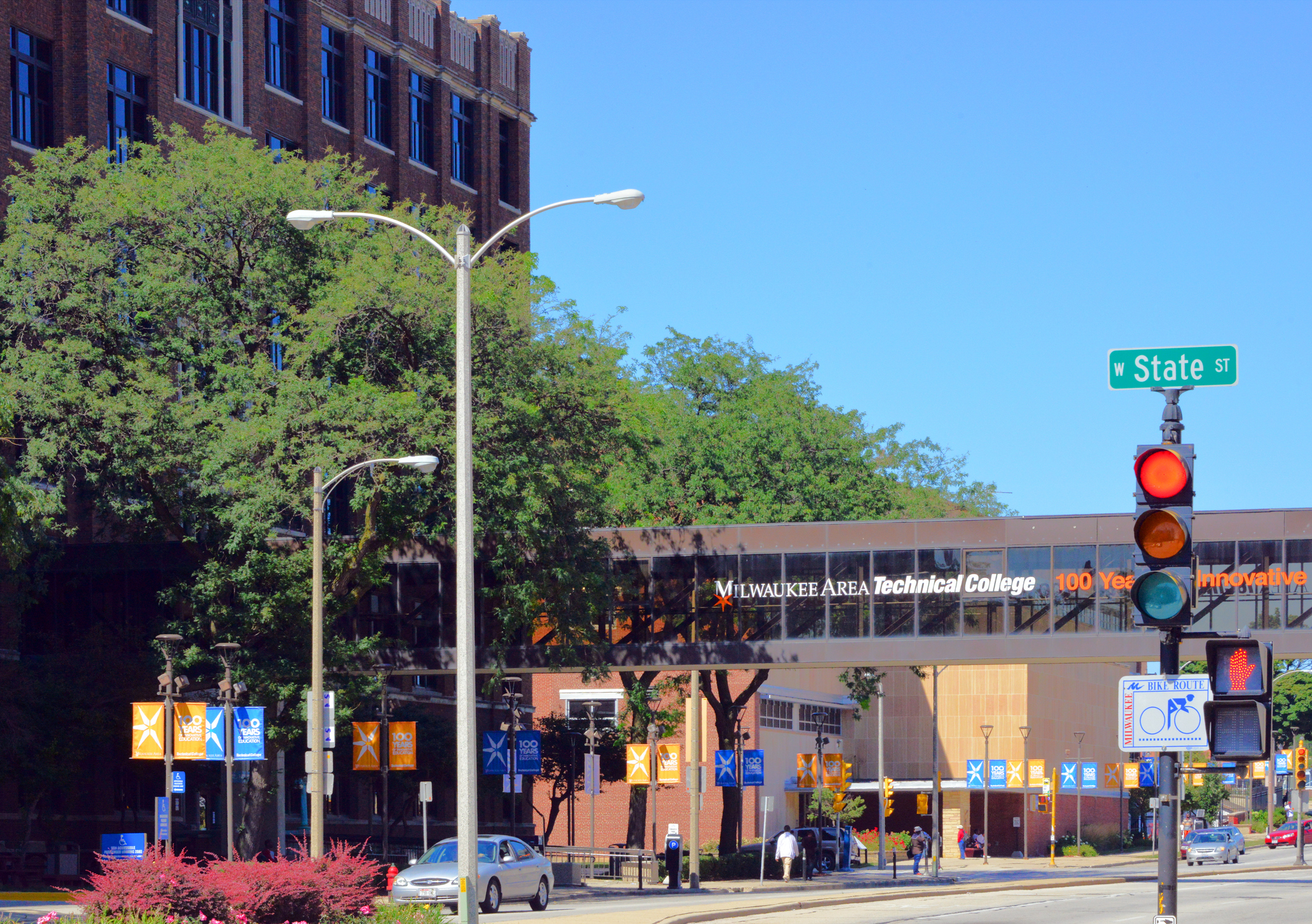 Milwaukee, Wisconsin, USA: Milwaukee Area Technical College Downtown Milwaukee Campus - public two-year vocational-technical college. MATC offers accredited associate degrees, vocational licenses, job training certificates, and adult enrichment courses - traffic light at the corner of West State Street and North 8th Street.