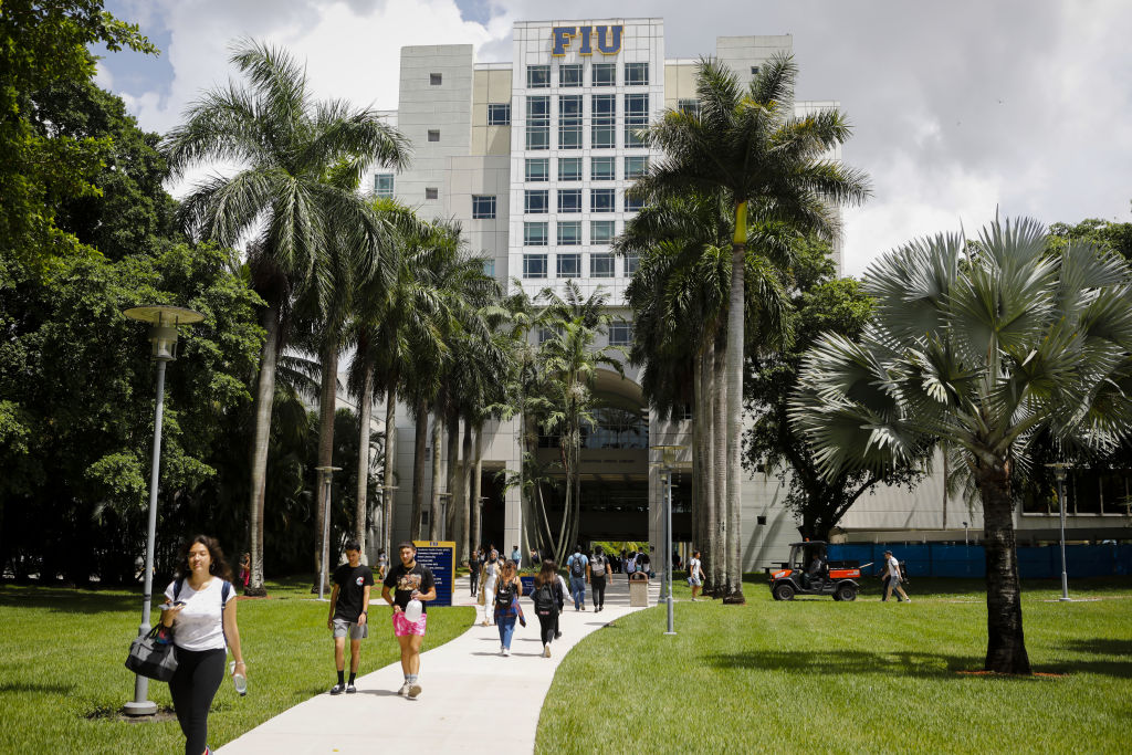 Students walking on campus at Florida International University (FIU) in Miami, Florida.