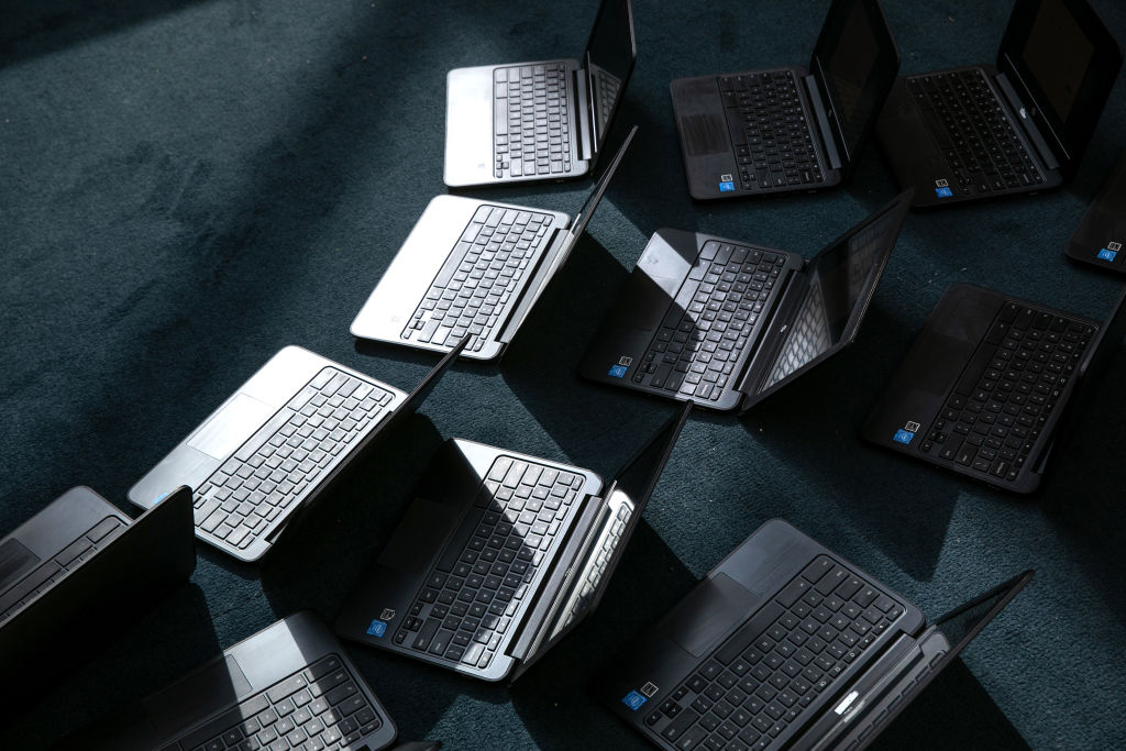 STAMFORD, CONNECTICUT - AUGUST 31: Chromebooks lie out after being cleaned in preparation for the Sept. 8 start of school at Newfield Elementary School on August 31, 2020 in Stamford, Connecticut. Due to the coronavirus pandemic Stamford Public Schools is opening the fall semester using a hybrid model, although many families have chosen the distance-learning option. The school system plans to distribute Chromebooks to all students during the fall semester. (Photo by John Moore/Getty Images)