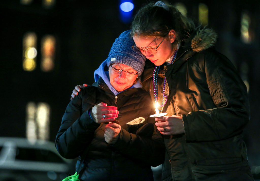 NEW HAVEN, CT - APRIL 3: Pam Shaw, mother of Rachael Shaw Rosenbaum, a Yale student who died by suicide last year in March 2021, attends a candlelight vigil organized by the group Elis for Rachael held on the New Haven Green. Comforting her is current Yale student Willow Sylvester, who met Shaw through Elis for Rachael, a group of Yale students, Yale alumni, and loved ones of Rachael Shaw-Rosenbaum that began meeting weekly via Zoom shortly after Rachael's passing to find a way to get much needed mental health reform on campus. The two had not met in person until the day of the vigil. (Photo by Stan Godlewski for the Washington Post)