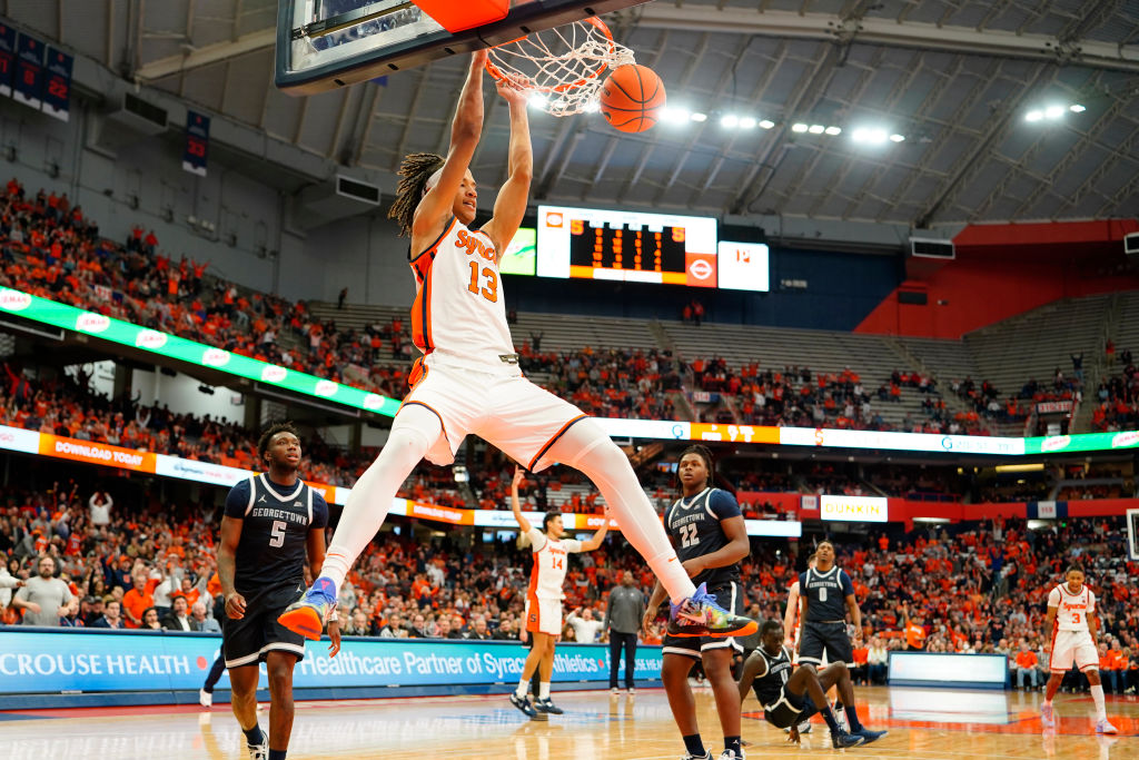 SYRACUSE, NY - DECEMBER 10: Syracuse Orange Forward Benny Williams (13) dunks the ball during the second half of the college basketball game between the Georgetown Hoyas and the Syracuse Orange on December 10, 2022, at the JMA Wireless Dome in Syracuse, NY. (Photo by Gregory Fisher/Icon Sportswire via Getty Images)