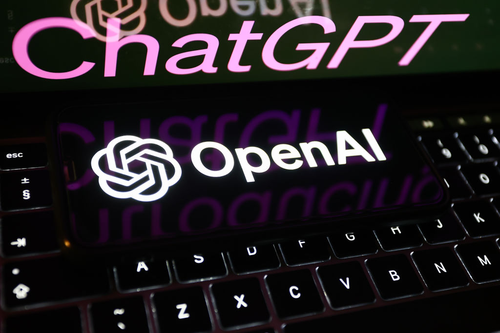 ChatGPT 4 sign on website displayed on a laptop screen and OpenAI logo displayed on a phone screen are seen in this illustration photo taken in Poland on March 14, 2023. (Photo by Jakub Porzycki/NurPhoto via Getty Images)