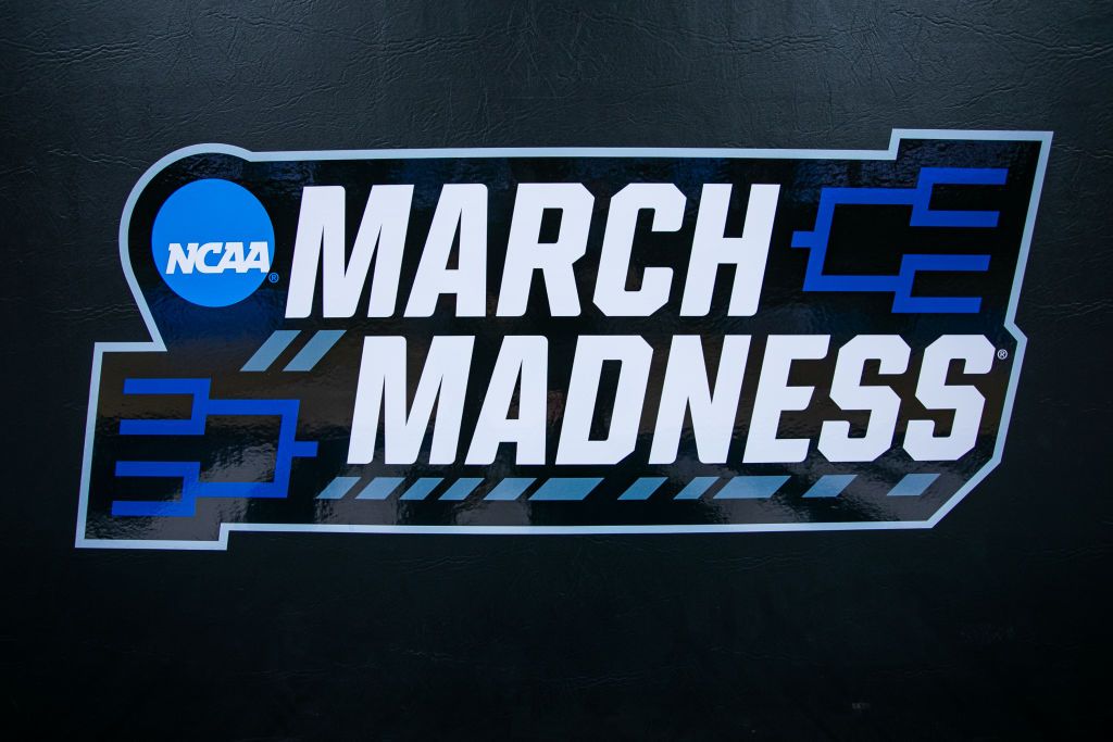 A photo of the NCAA March Madness logo during the men's college basketball game between the Loyola Chicago Ramblers and the Ohio State Buckeyes at PPG Paints Arena in Pittsburgh, PA.