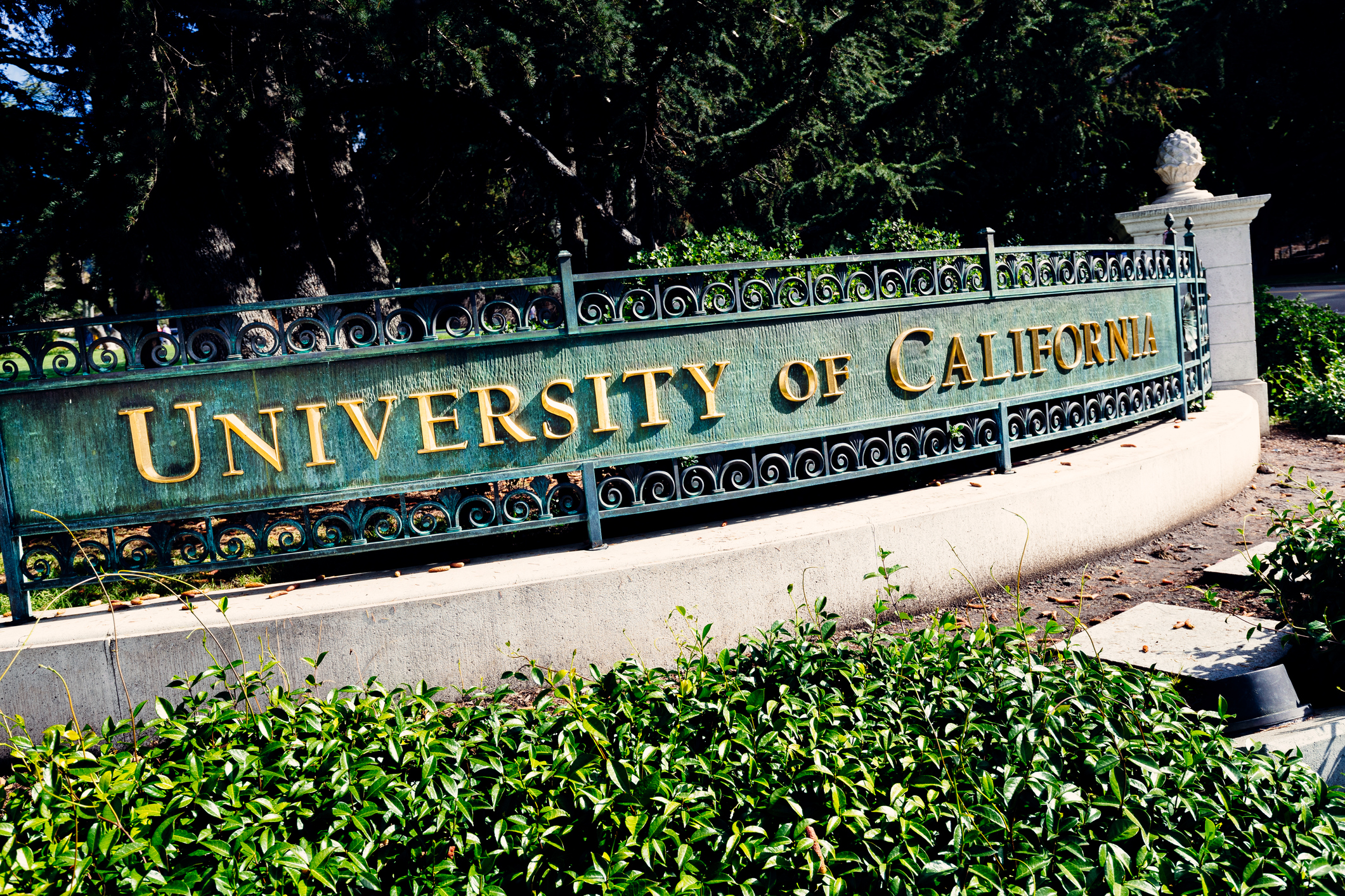 Berkeley, California, USA - October 15, 2016: University of California entrance sign on the corner of Oxford Street and Center Street at Berkeley, California. Over 150 years old, and with many Nobel Prizes winners (they even have reserved parking spots for them), the campus serves almost 40,000 students within an open green space.