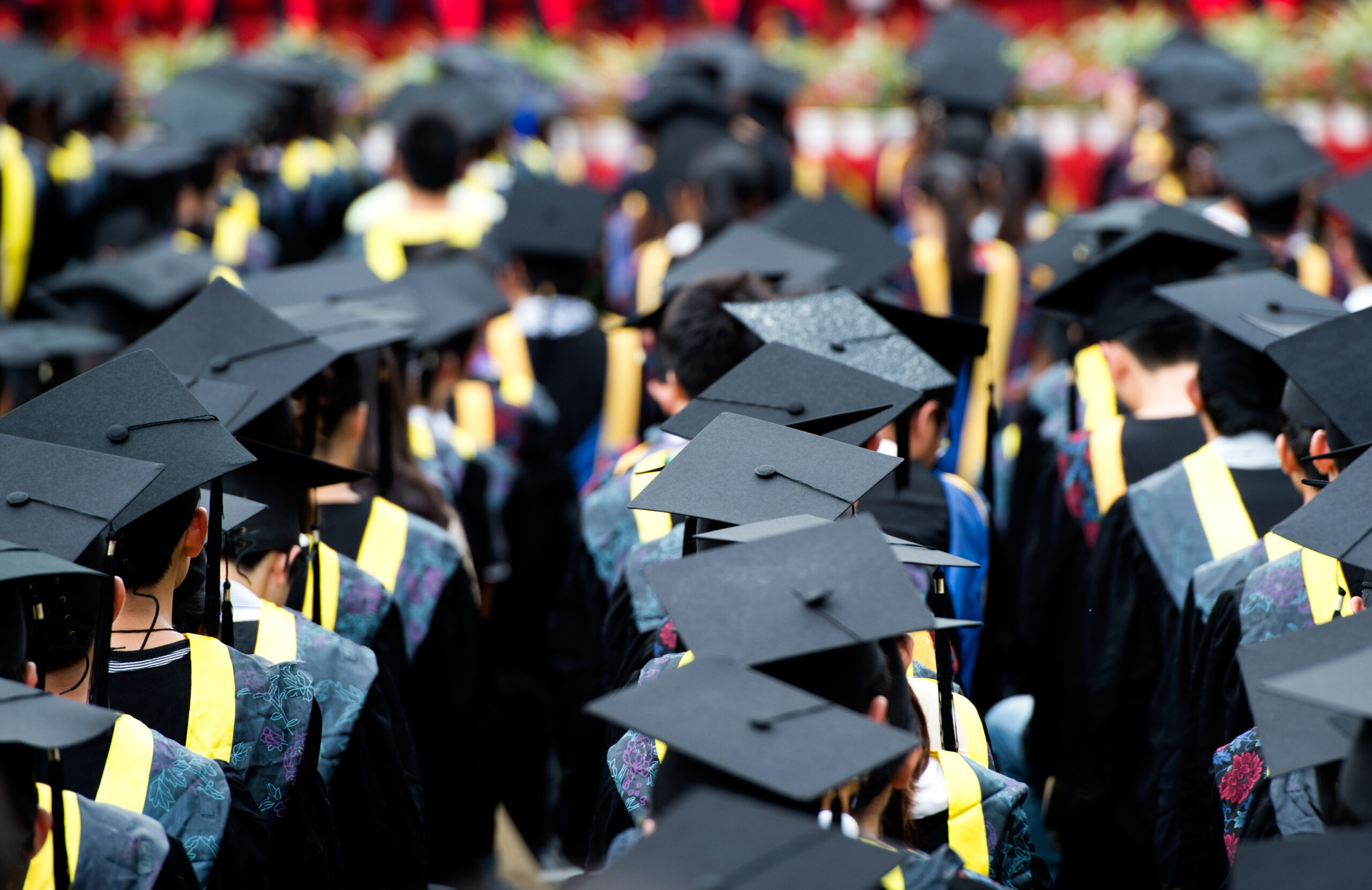 Shot of graduation caps during commencement.