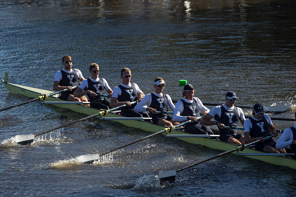 Members of the Yale championship eight crew team make their way up the Charles River