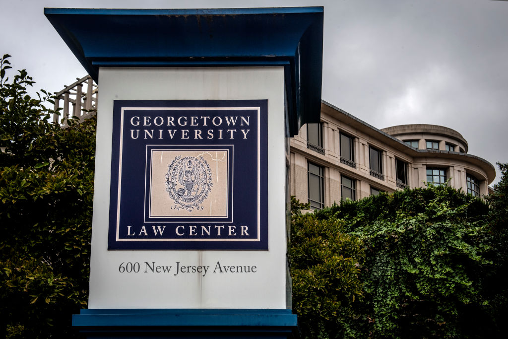 Outdoor sign that reads "Georgetown University Law Center"