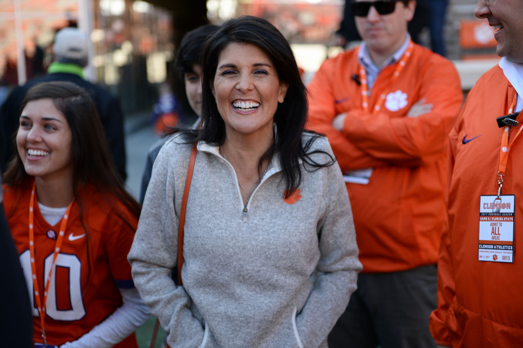 Nikki Haley walks onto the field during pre-game between the Clemson Tigers and the Florida State Seminoles