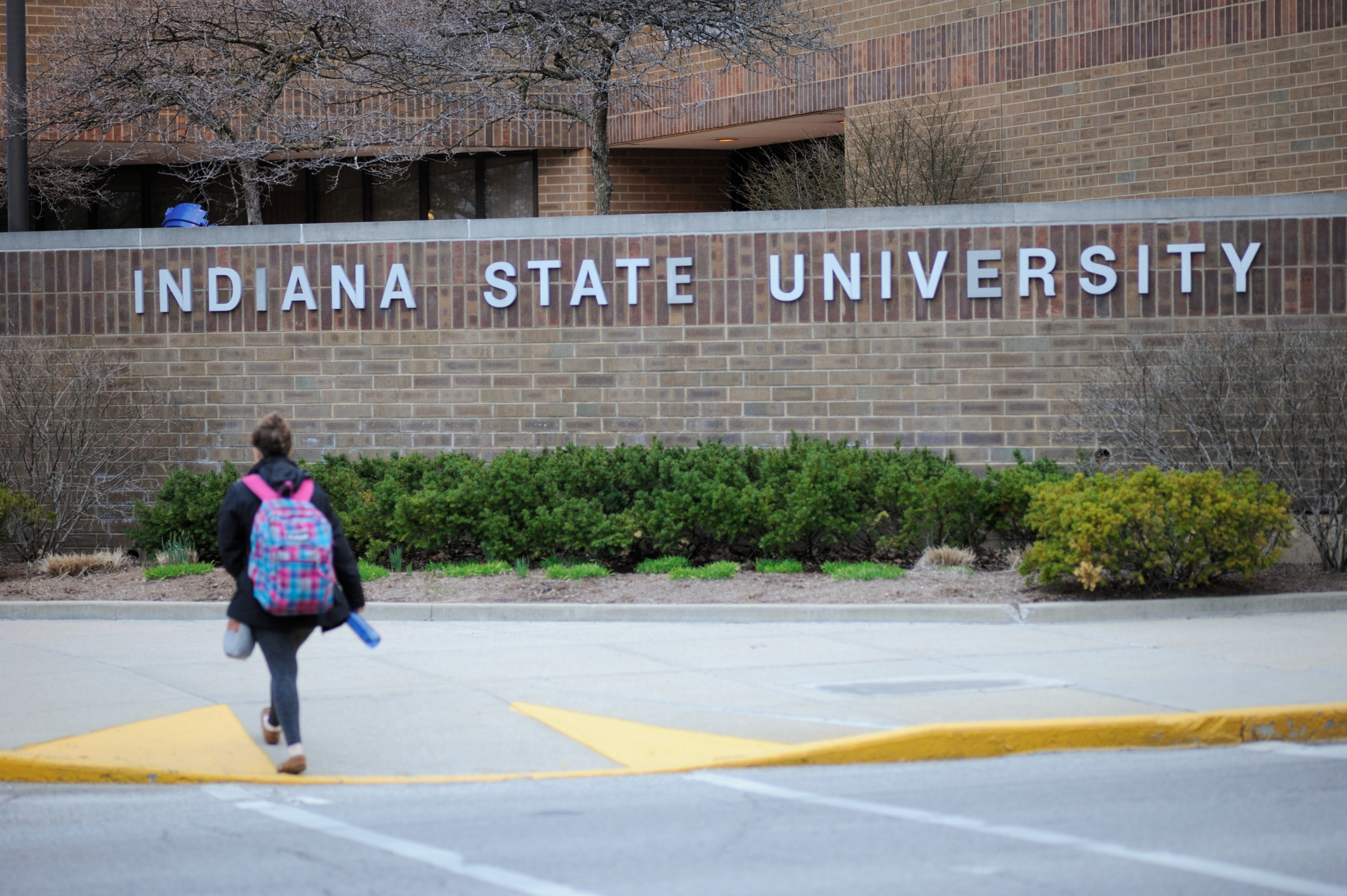 Indiana State University sign with student