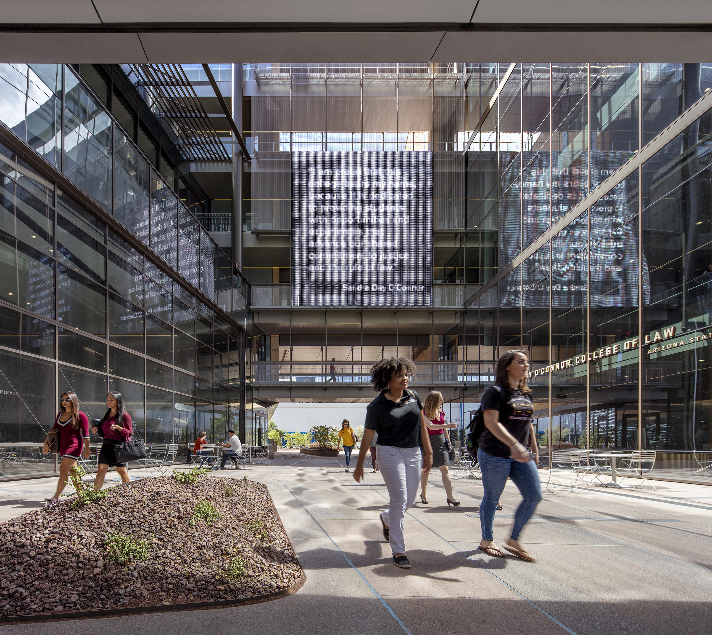 Students walk through the courtyard of the Sandra Day O'Connor College of Law on the Arizona State University campus in downtown Phoenix.