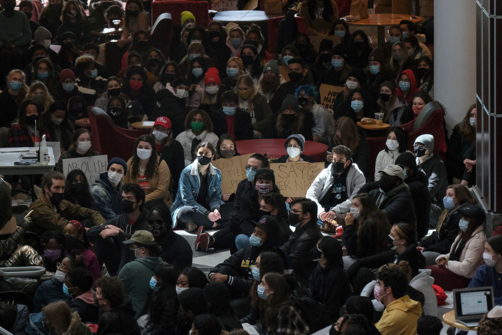 Ohio State University students staging a sit-in in a crowded room