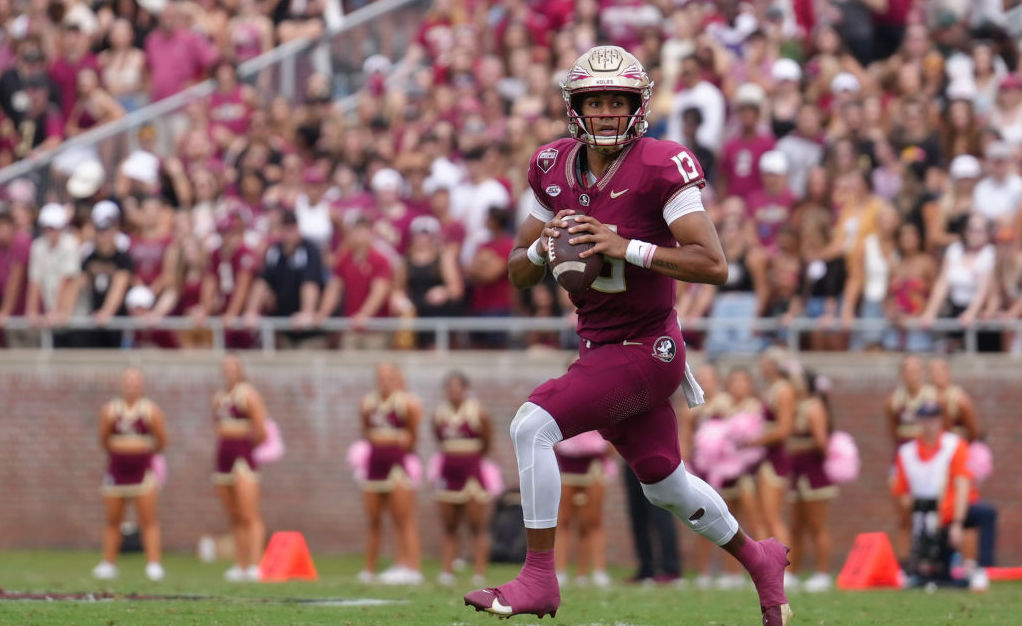 Florida State player running at football game