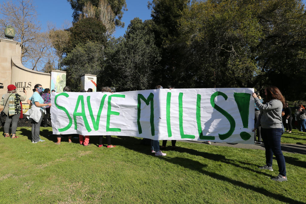 Mills College students and alumni at rally, protesting school closure